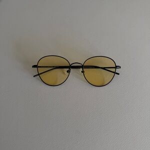 Jin’s metal sunglasses